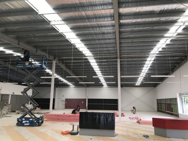 Large warehouse interior being worked on